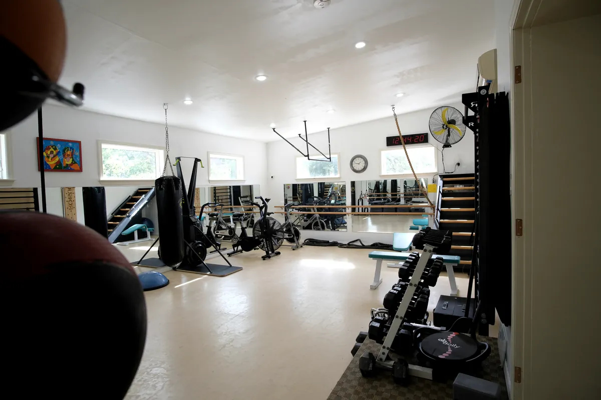 Air bikes and open floor in the boxing area